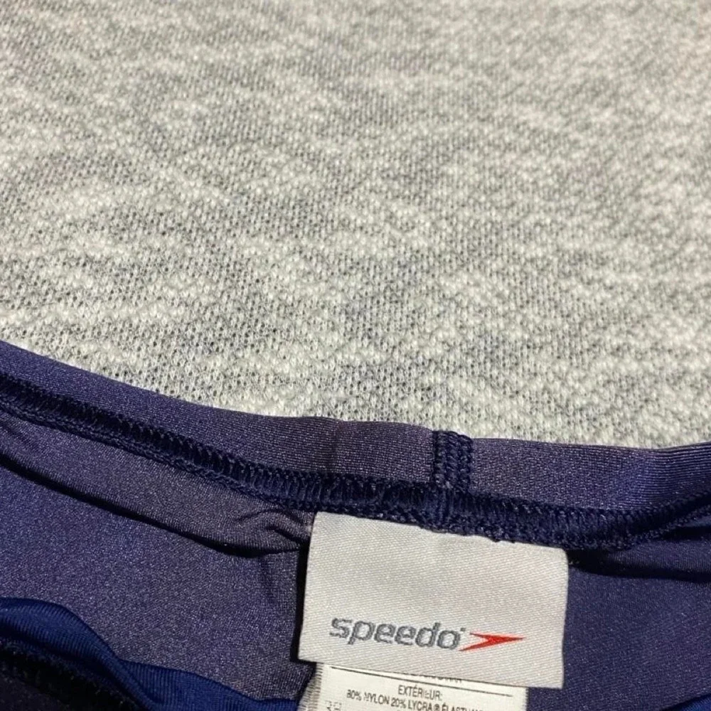Speedo swim trunks with blue multicolor diagonal stripes men 38. SKU-B646
